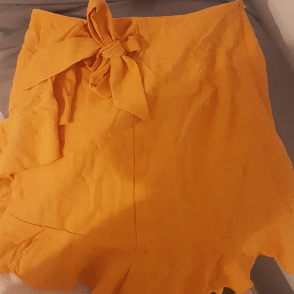 2 skirts one has shorts underneath.